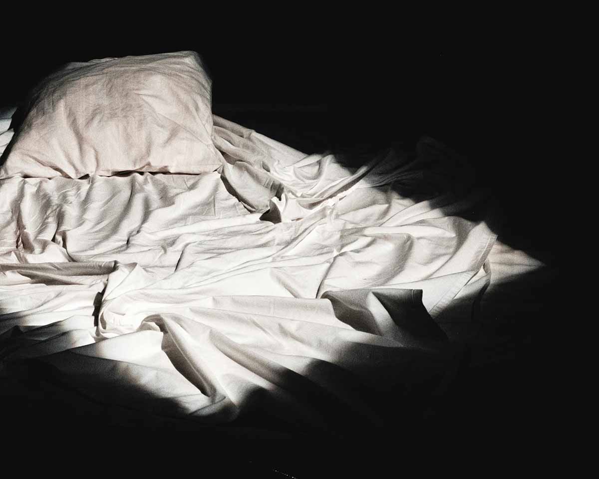 Lakens in leeg bed